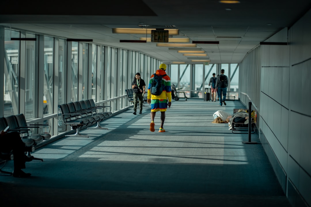 Don’t Sit Yet: The Boarding-Gate Walking Rule